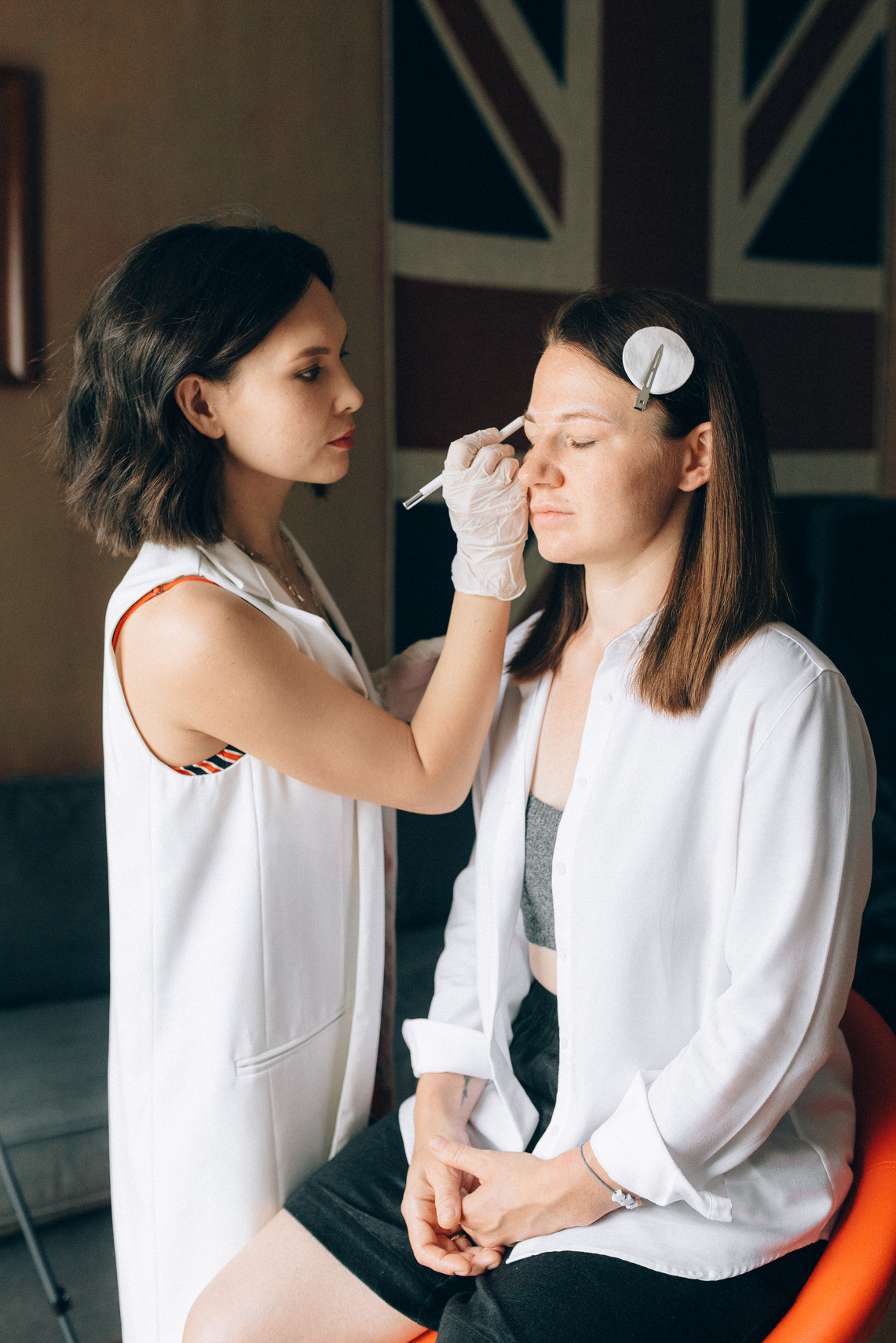 Make-up Artist Applying Make-up to Her Client